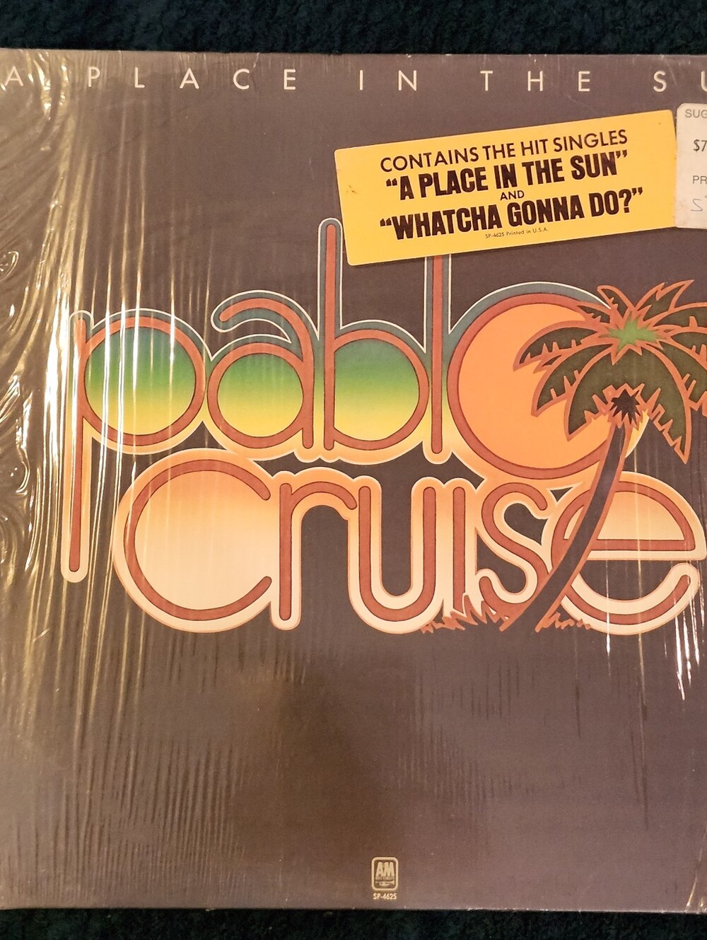 the 1977 vinyl LP album cover of A Place in the Sun by Pablo Cruise